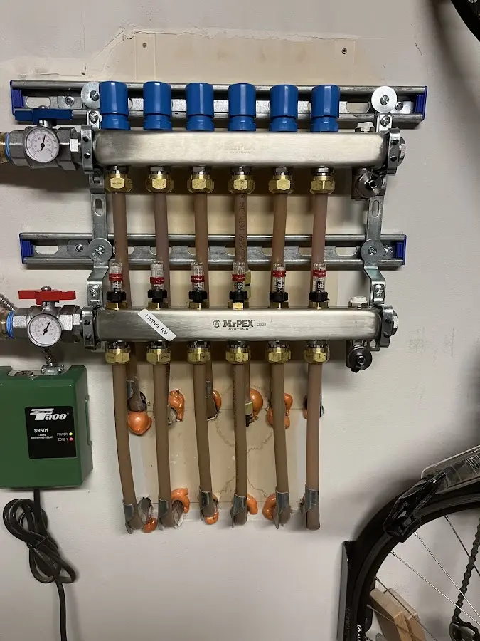 Plumber performing Water Heater Repair at a residential property in Schuyler Falls